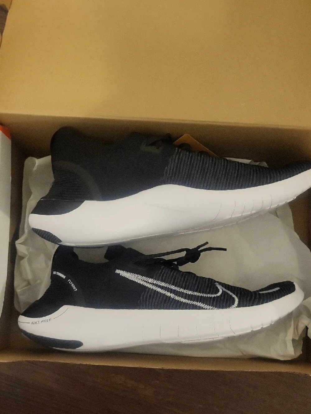 Nike Free Run  Men’s Black and White Slip-On Knit Sneakers